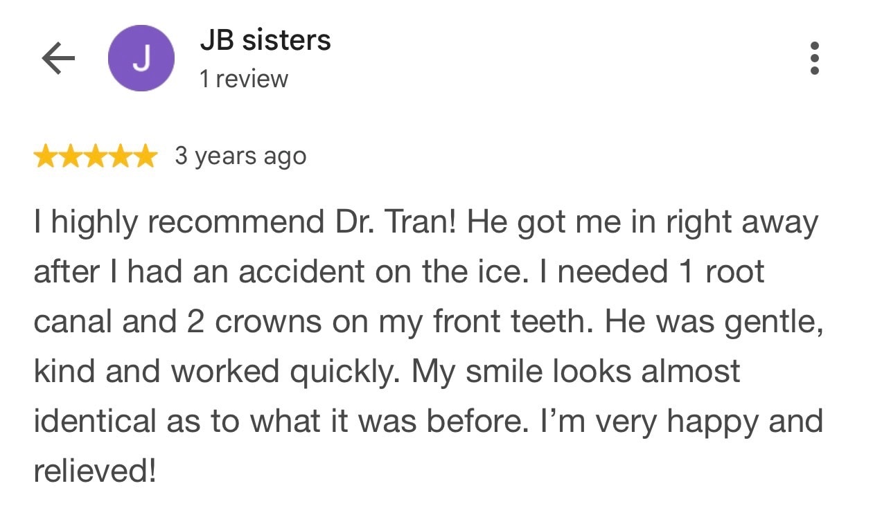 Five-star Google review from JB sisters praising Dr. Tran's gentle emergency dental treatment.